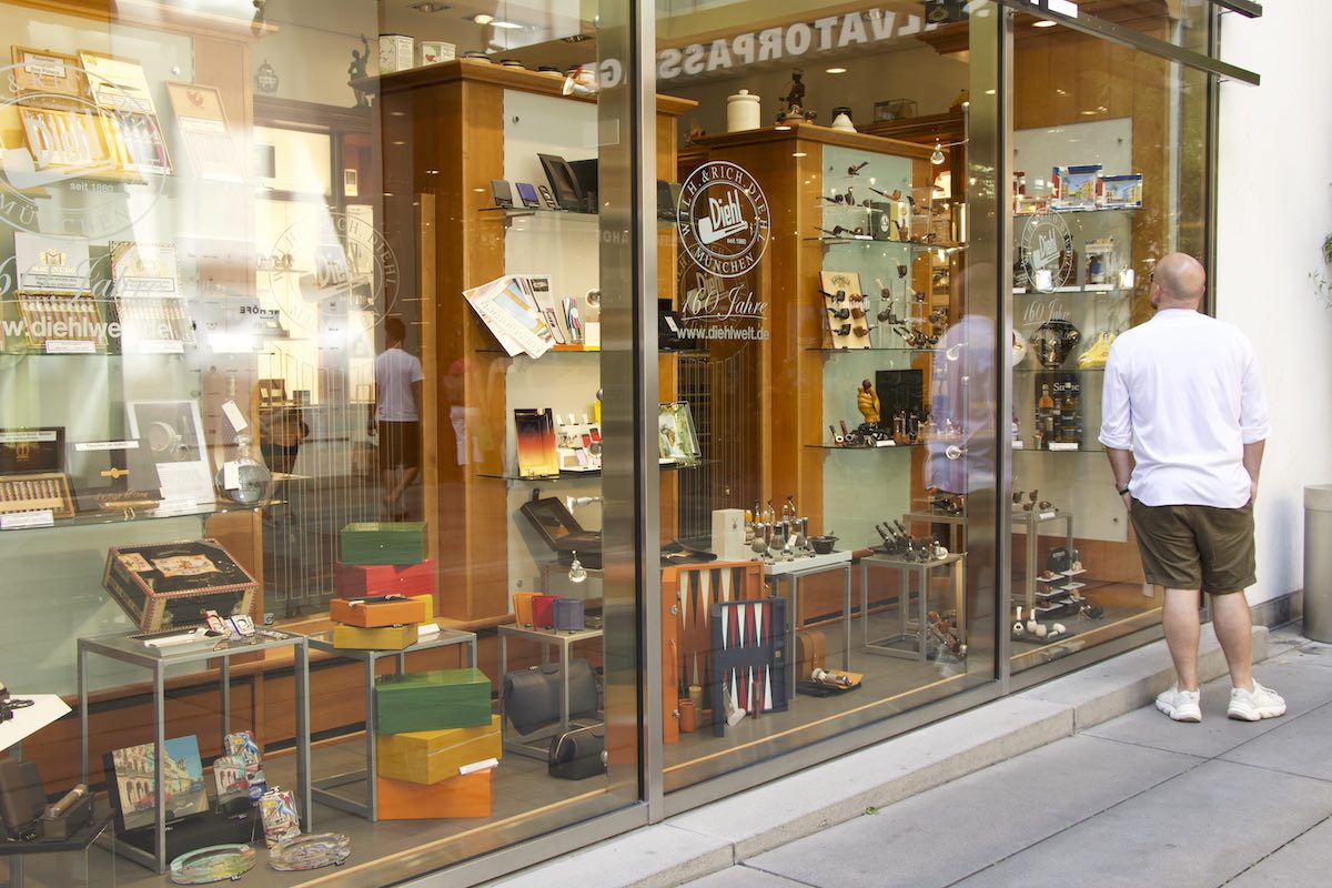 A man browsing an accessories store